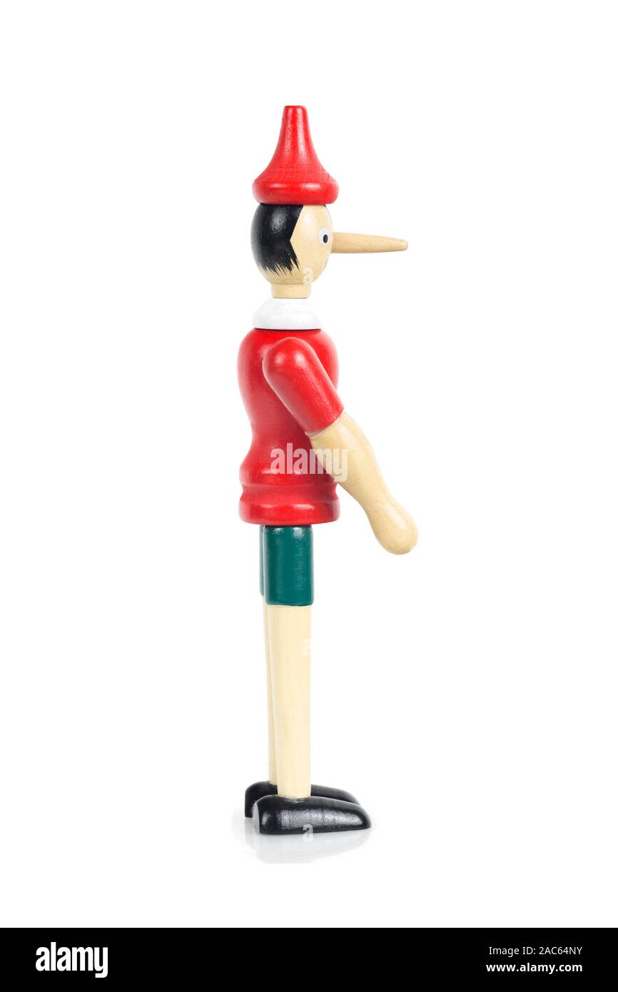 Wooden Pinocchio doll cutout Stock Photo