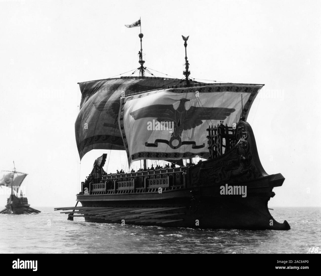Roman Galley and Pirate Ship in Sea Battle filmed in Italy for BEN - HUR : A TALE OF THE CHRIST 1925 director FRED NIBLO novel General Lew Wallace adaptation June Mathis Silent Movie Metro Goldwyn Mayer Stock Photo