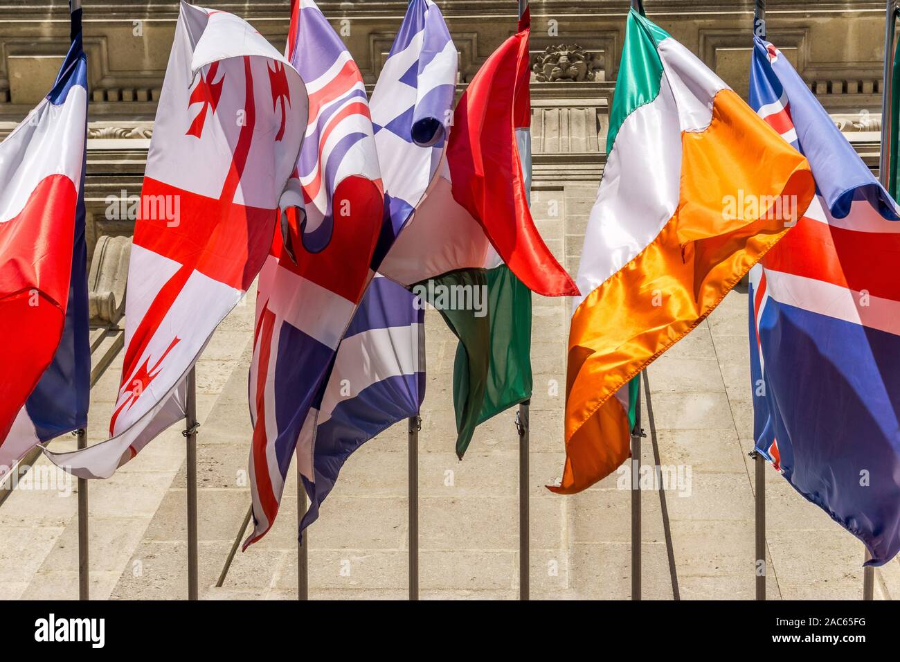 Hofburg former Imperial Palace. Currently residence of the Austrian President,  International display of flags, Vienna, Austria Stock Photo