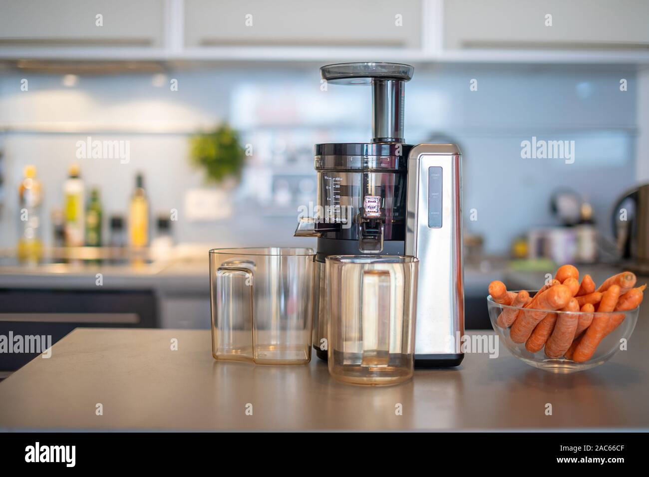 https://c8.alamy.com/comp/2AC66CF/close-up-of-fresh-carrot-for-juice-and-juicer-healthy-eating-lifestyle-concept-2AC66CF.jpg