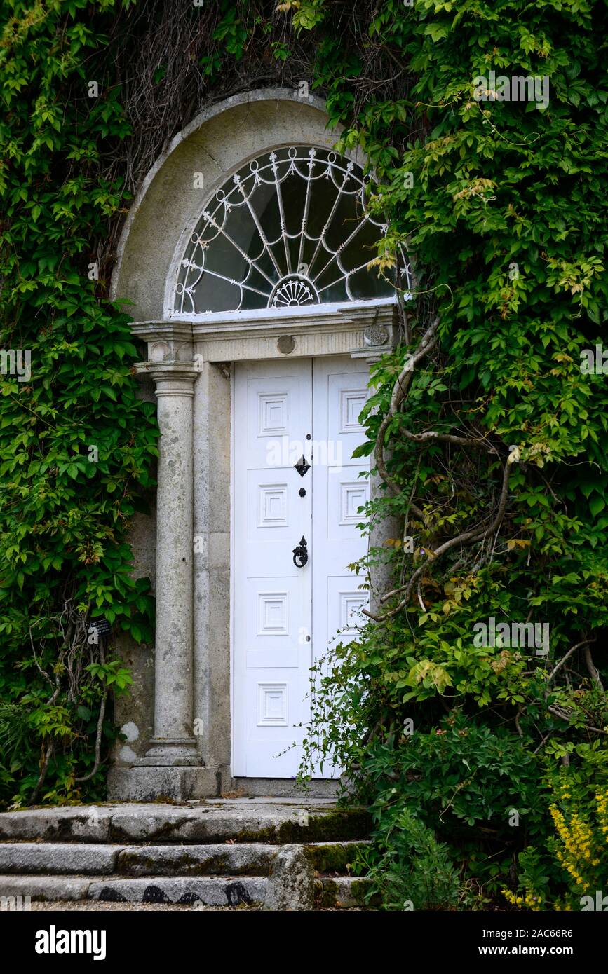 White door,georgian doorway,altamont gardens,carlow,Fanlight,semi-circular window,glazing bars,radiating from the centre,open fan,georgian door, Stock Photo