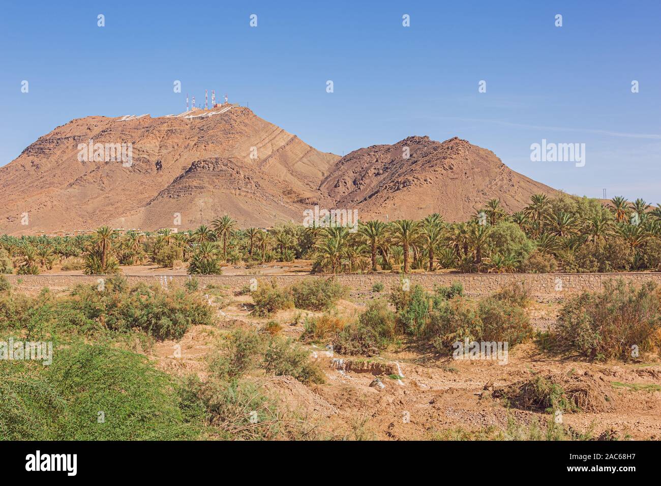Writing "for God, Homeland and King" on a mountain near Zagora above