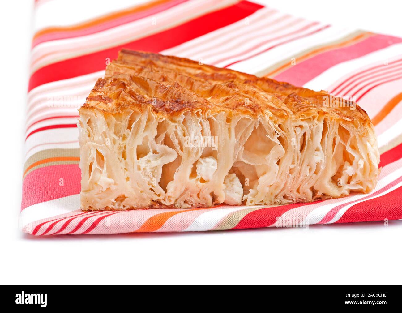 Piece of home made cheese pie on white background Stock Photo