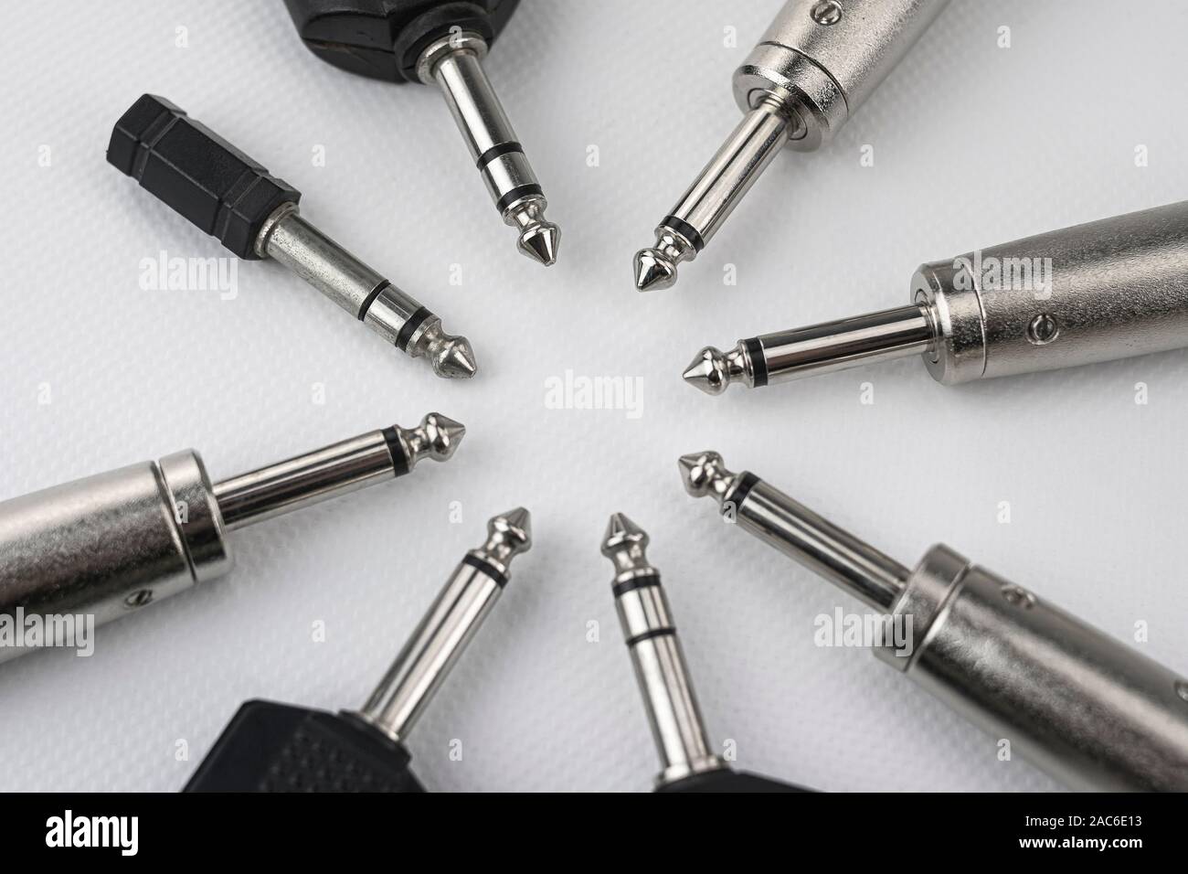 Connectors with mono and stereo jack terminals, and conversion to mini