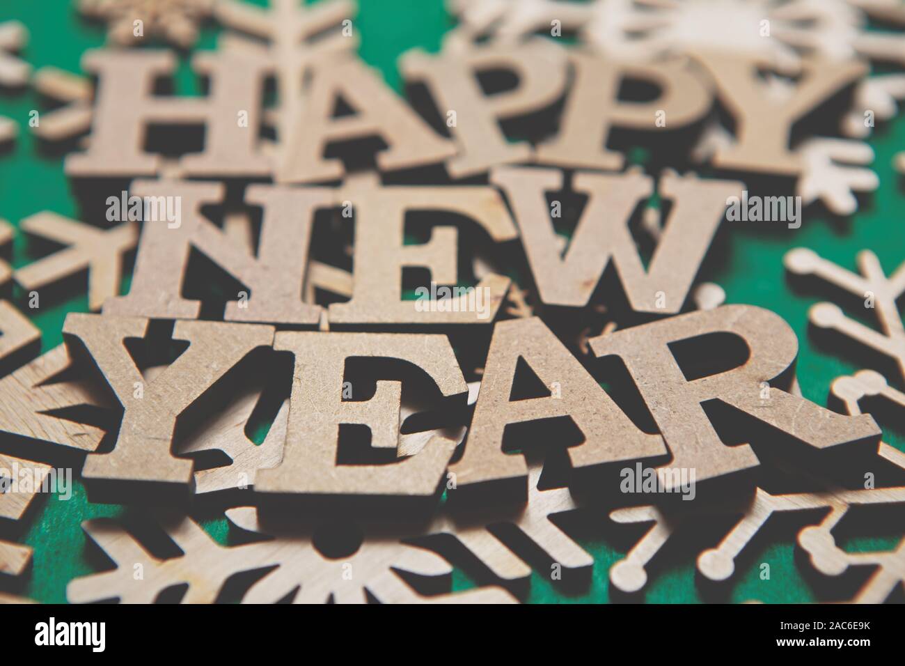 Green Happy New Year Background Wooden Alphabet Letters And Hand Made Snow Flakes Made From Natural Ecological Material Eco Friendly Home Decor For Wi Stock Photo Alamy