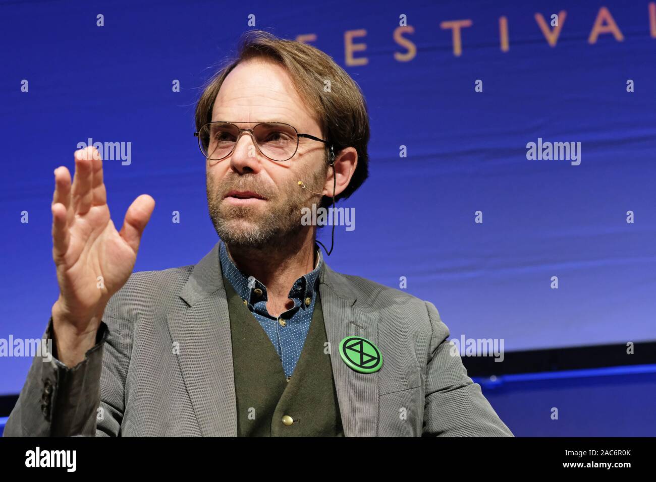 Hay Festival Winter Weekend , Hay on Wye, Powys, Wales, UK - Sunday 1st December 2019 - Rupert Read Extinction Rebellion ( XR ) spokesman on stage talking about the climate emergency at the Hay Festival Winter Weekend at 1pm. Photo Steven May / Alamy Live News Stock Photo