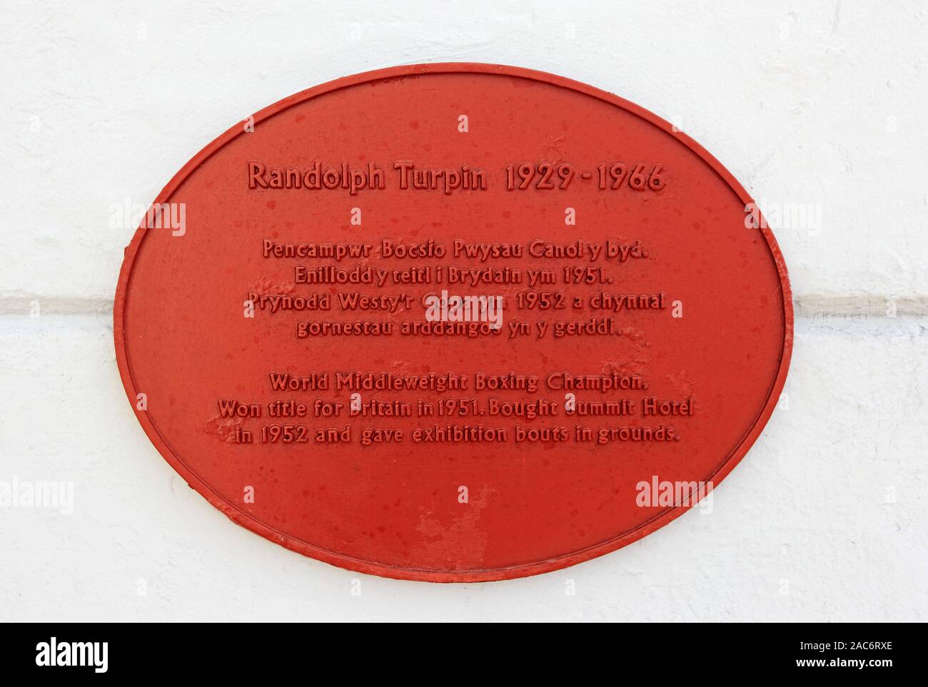 Red Plaque showing association between Randolph Turpin, boxer, and Summit Hotel complex, Great Orme, Llandudno Stock Photo