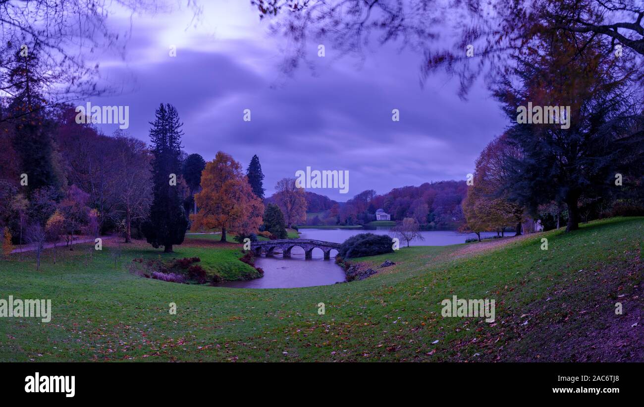 Stourhead, UK - November 12, 2019:  Blue hour shot of Stourhead gardens with the Pantheon and lake, in late autumn Stock Photo