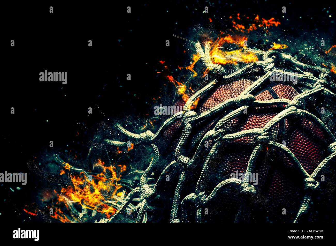 Basketball ball on black background with fire Stock Photo