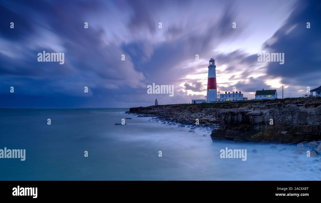 Portland Bill, UK - November 4, 2019: Portland Bill Light house at sunset on a stormy day Stock Photo