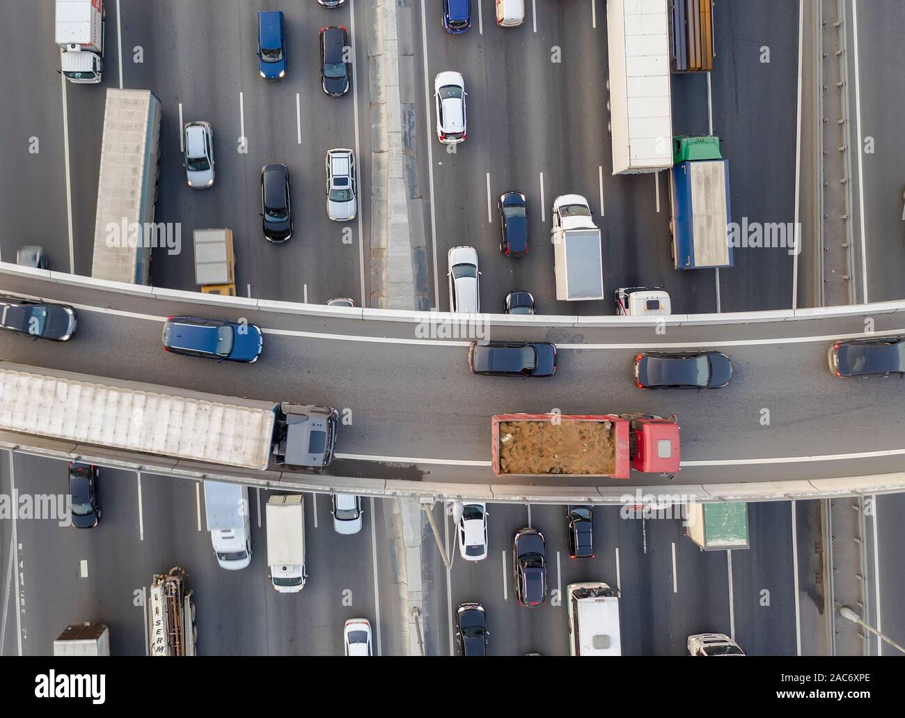 View from the air on the movement of cars on the overpasses at the intersection with the ring road and the exit from the city Stock Photo