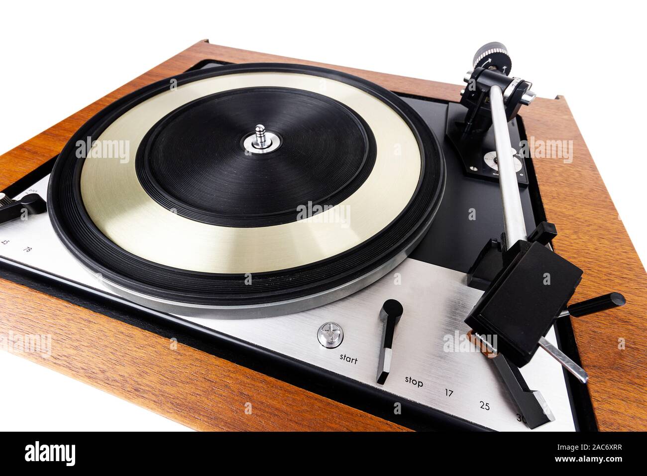 Vintage turntable vinyl record player isolated on white. Wooden plinth ...