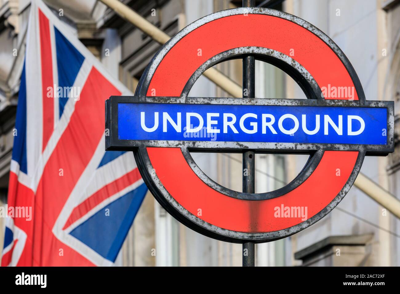 London Underground, iconic public transport tube sign with Union Jack ...