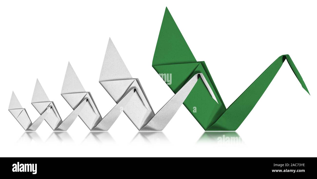 Leadership concept, four white paper swans follow a green swan, command and teaching symbol. Isolated on white background with reflections Stock Photo