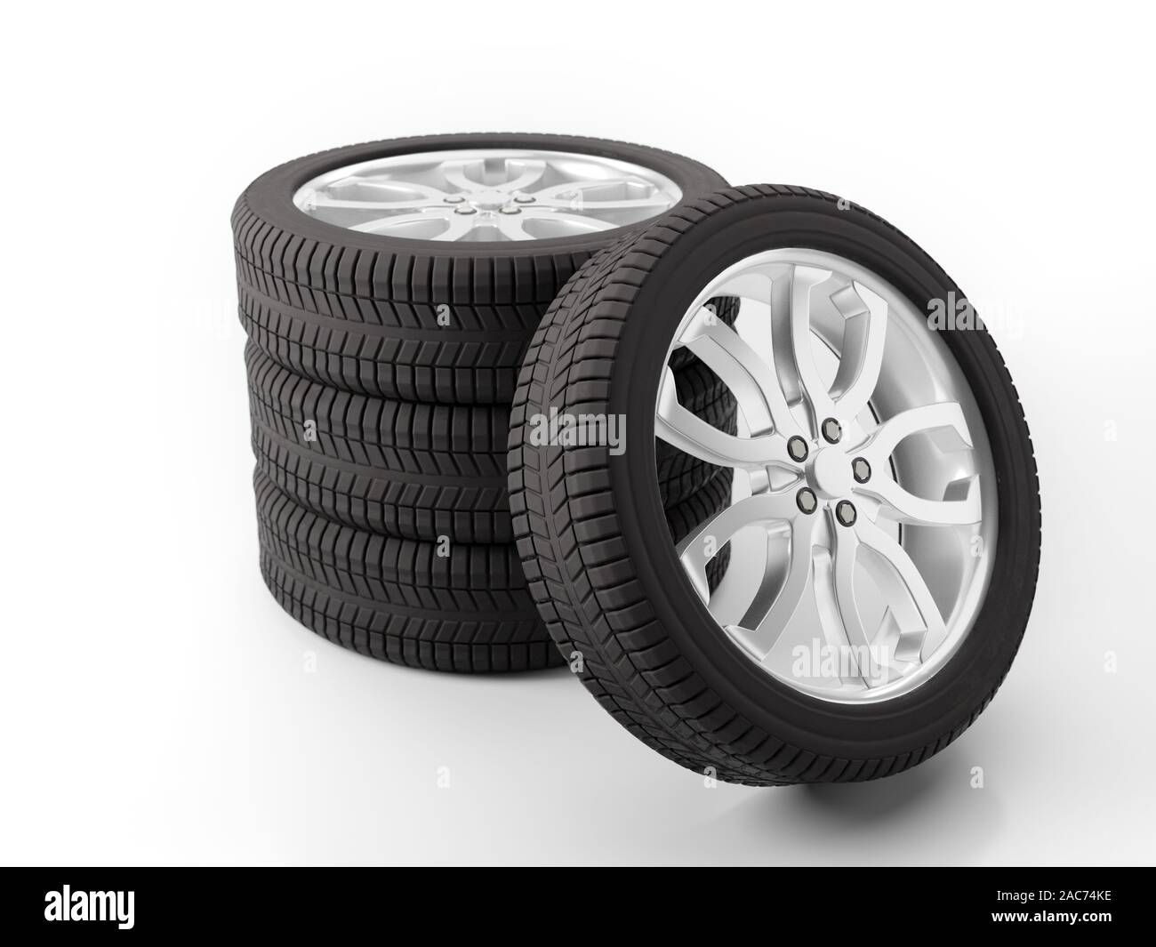 Set of four car tires with rims shot on white Stock Photo
