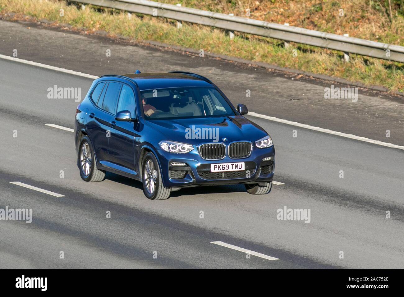 BMW X3 (G01); Vehicular traffic, transport, modern vehicles, saloon cars, south-bound motoring on the M61 motorway, UK Stock Photo