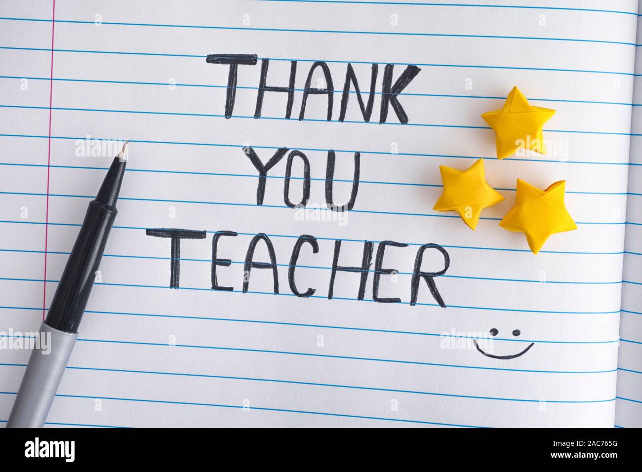 Thank You Teacher. Lined paper notepad with origami stars and words Thank  You Teacher. Close up Stock Photo - Alamy, image size:1300x956
