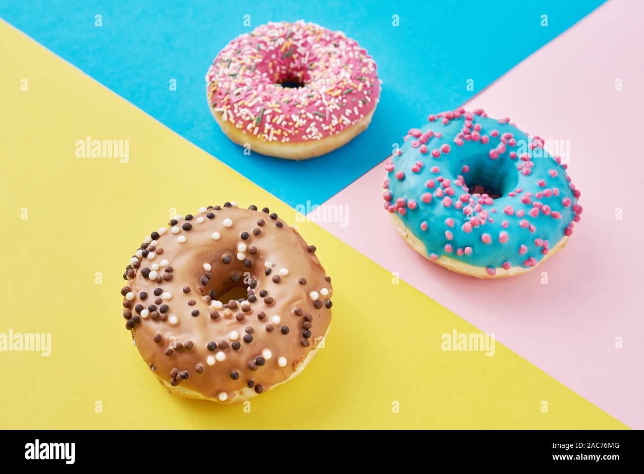 Download Donuts On Pastel Pink Yellow And Blue Background Minimalism Creative Food Composition Flat Lay Style Stock Photo Alamy Yellowimages Mockups
