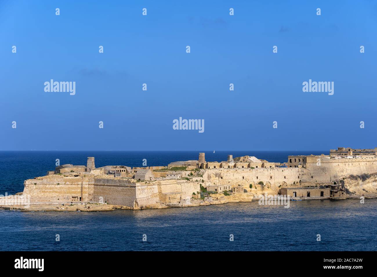 Fort Ricasoli in Kalkara, Malta, fortification built by the Order of Saint John in 17th century, guarding the entrance to Grand Harbour in the Mediter Stock Photo