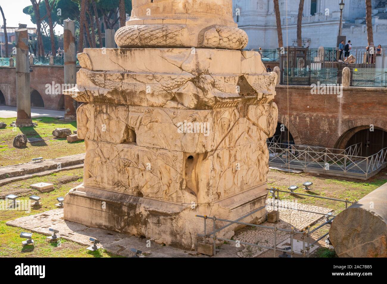 Traian Column detail with ruins of Cesar Forum in Rome. bottom of ...