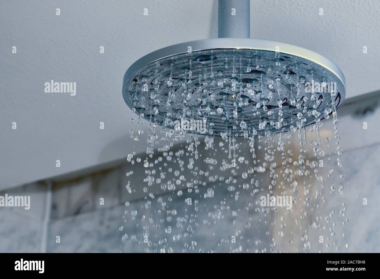 Shower water flowing Stock Photo - Alamy