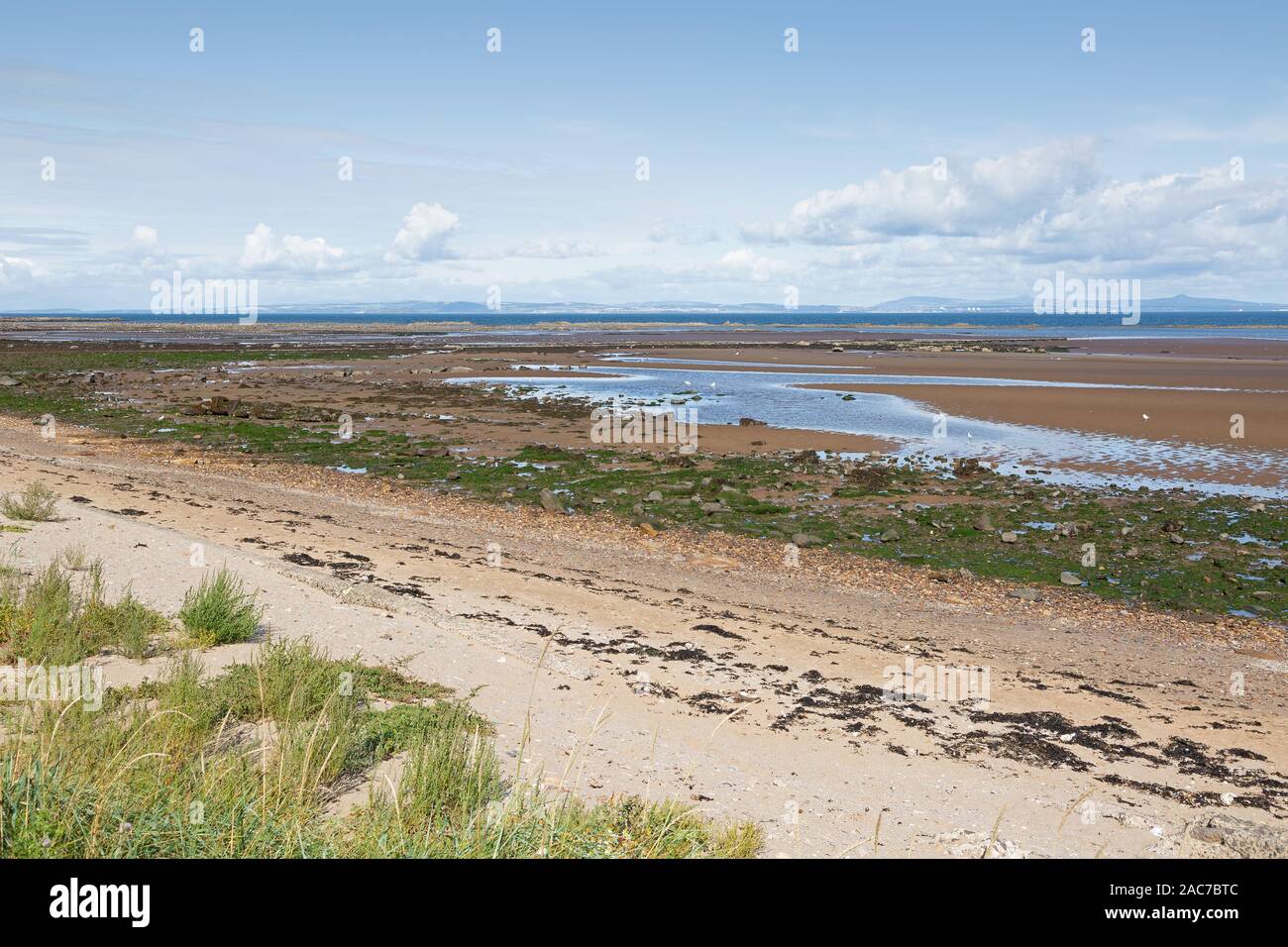 Beach at Seton Sands in Scotland at low tide overlooking the Firth of Forth Stock Photo