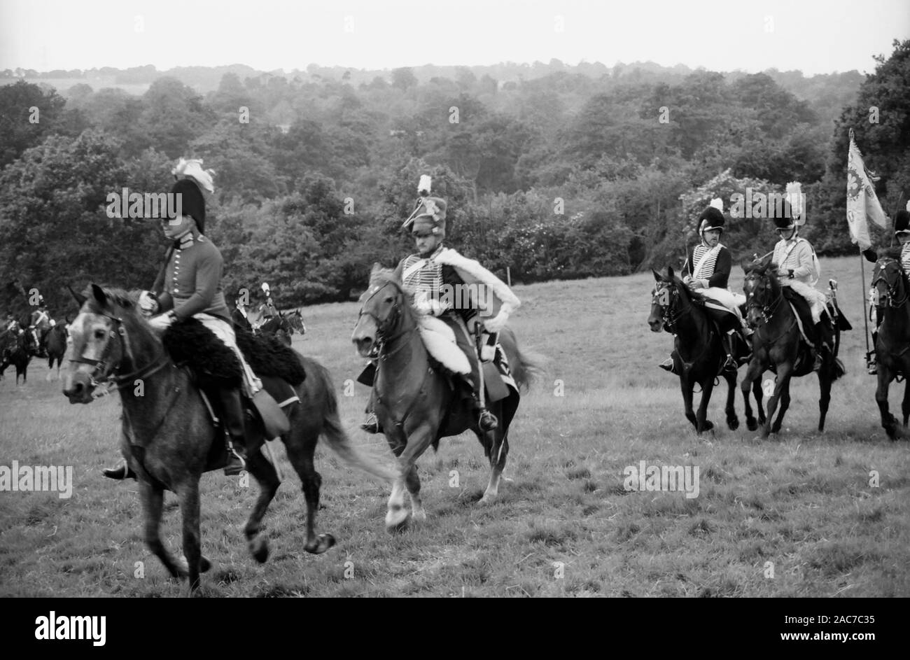 Re-enactment of a Napoleonic War battle in the grounds of Battle Abbey, East Sussex by the Napoleonic Association: a cavalry troop in action.  Circa 1994 Stock Photo