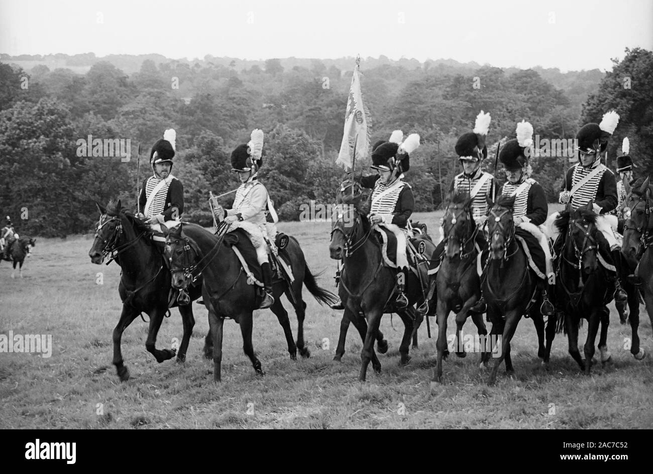 Re-enactment of a Napoleonic War battle in the grounds of Battle Abbey, East Sussex by the Napoleonic Association: a cavalry troop in action.  Circa 1994 Stock Photo