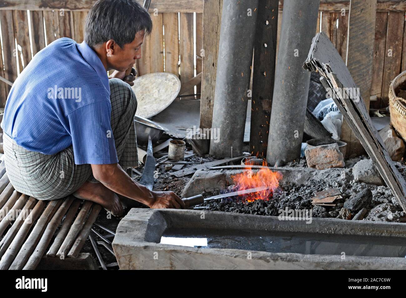 Blacksmith working in a shop. Inle Lake Myanmar Burma Stock Photo Alamy