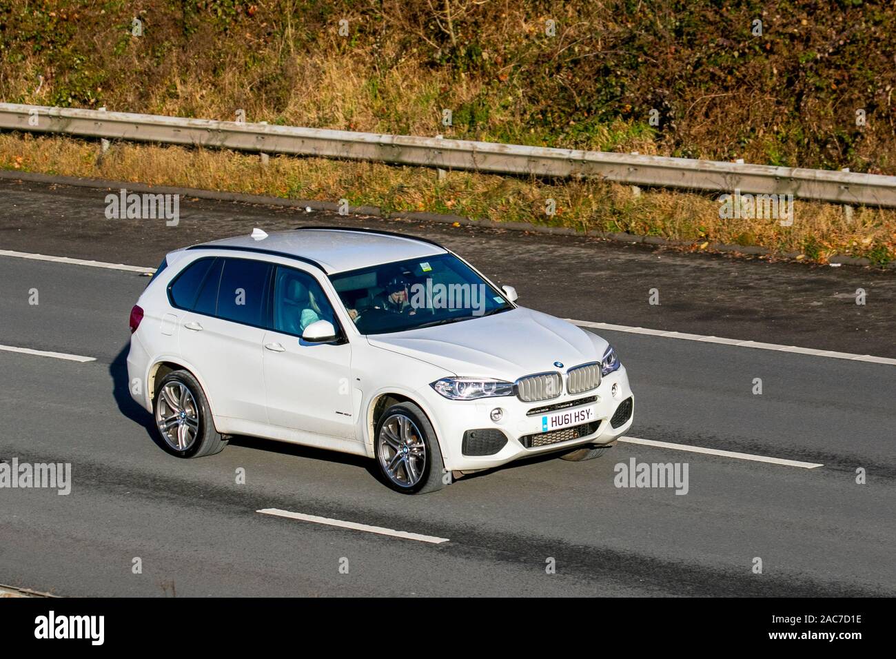 2015 white BMW X5 Xdrive 40D M Sport Auto; Vehicular traffic, transport, modern vehicles, saloon cars, south-bound motoring on the M61 motorway, UK Stock Photo