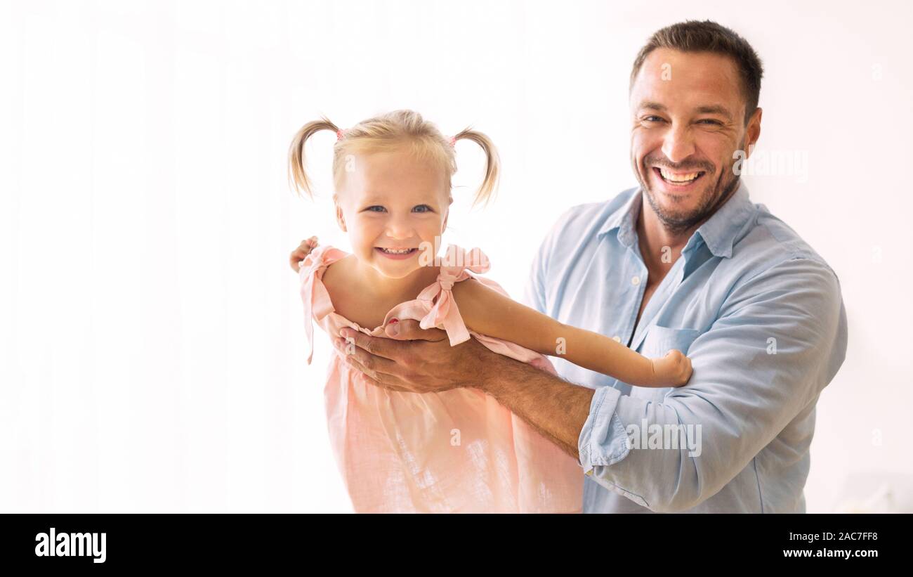 Happy single parent spending time with his child Stock Photo