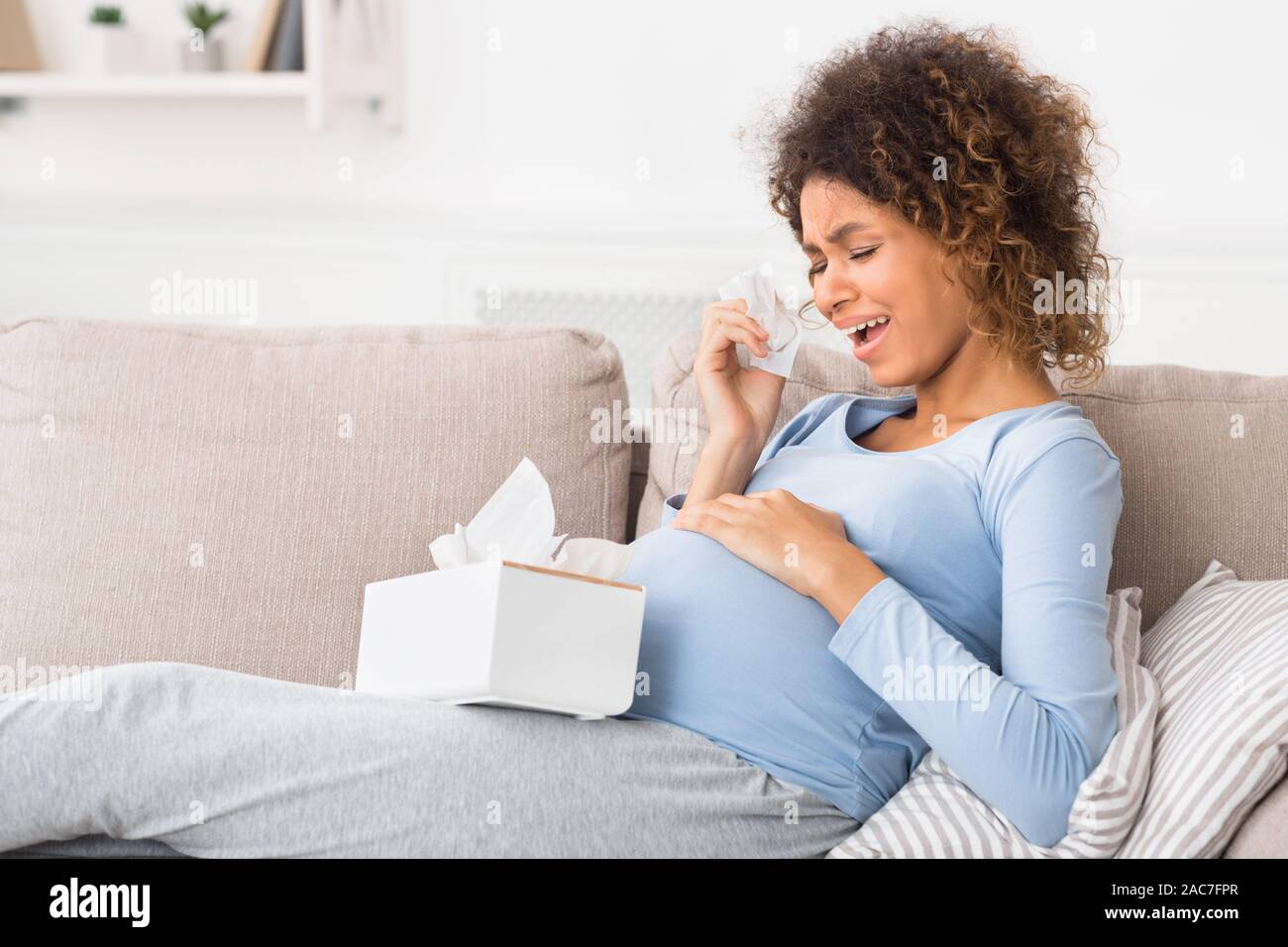 Pregnancy hormones concept. Emotional pregnant woman crying Stock Photo