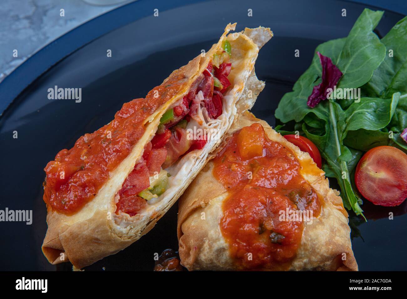 Turkish Pacanga Boregi with pastirma (pastrami) and cheddar (melted