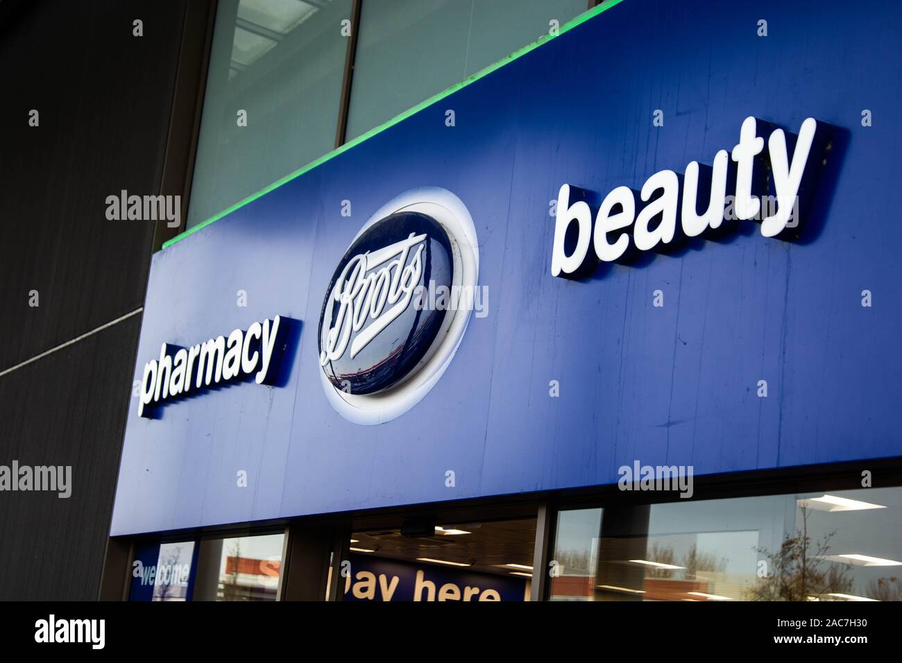 Rushden, Northamptonshire, United Kingdom - 15 November 2019 - Shopping center in Rushden. The Boots pharmacy store front. Stock Photo