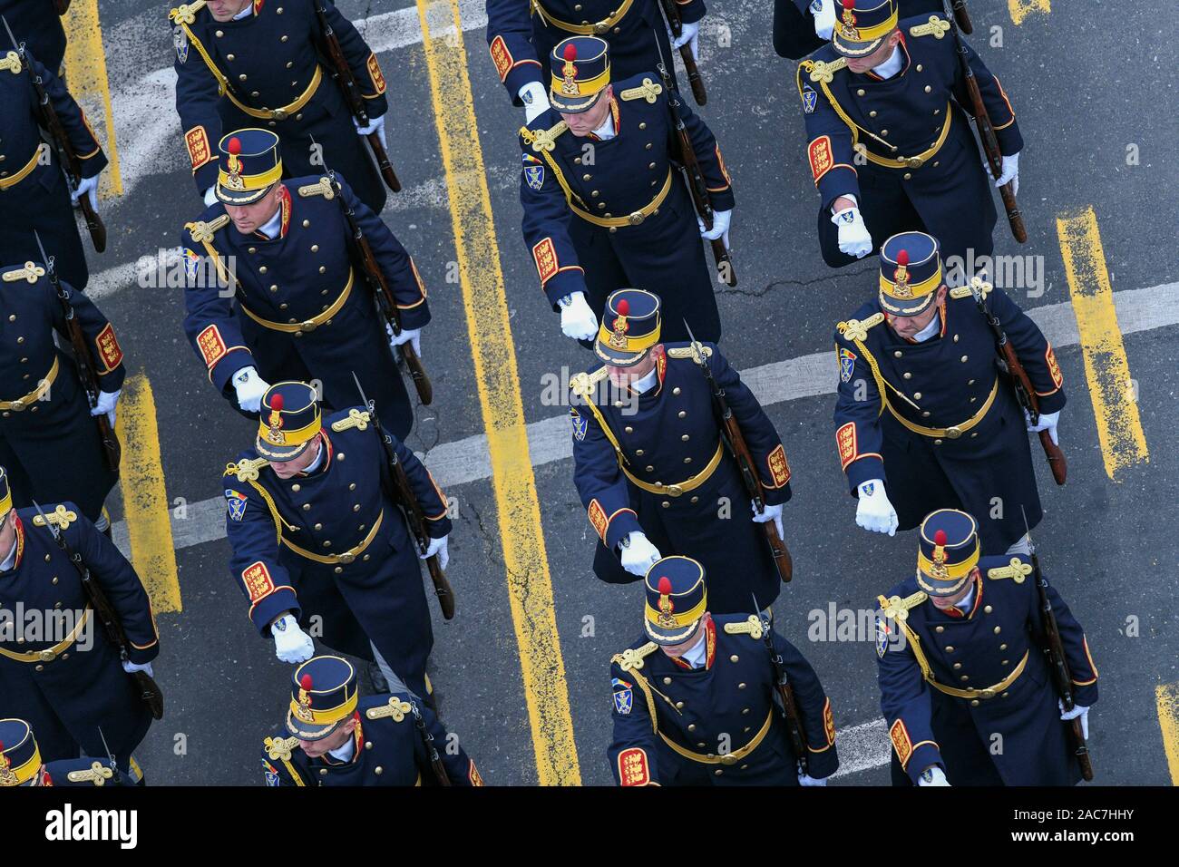 Bucharest, Romania - December 01, 2019: Romanian military firemen march in front of the Triumph Arch during a military parade marking Romania's Great Stock Photo