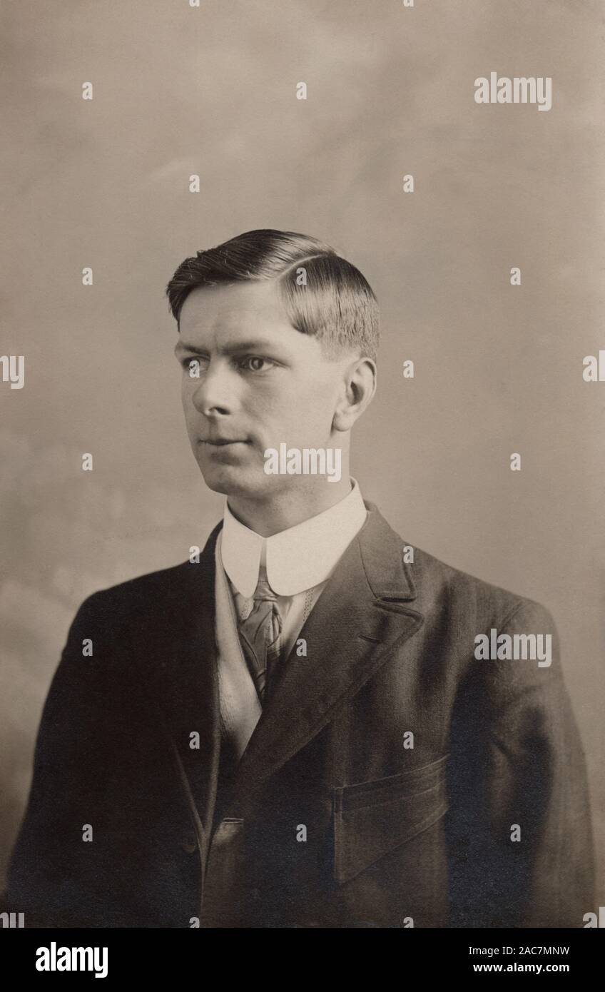 Vintage photographic postcard of a young man circa 1910 Stock Photo - Alamy