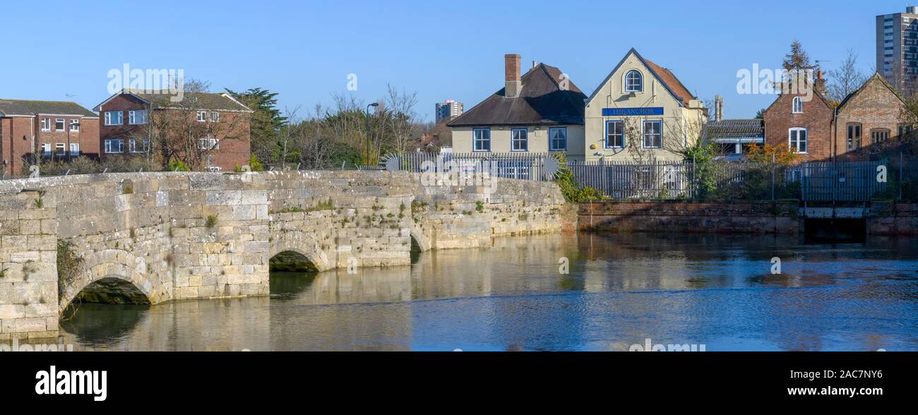 The Old Redbridge East Bridge, over River Test at Redbridge, Southampton, Hampshire, a grade II listed building, England ,UK. Stock Photo