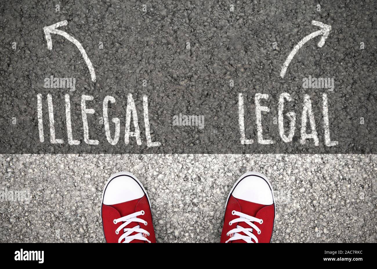 Legal or illegal decision at a crossroad Stock Photo