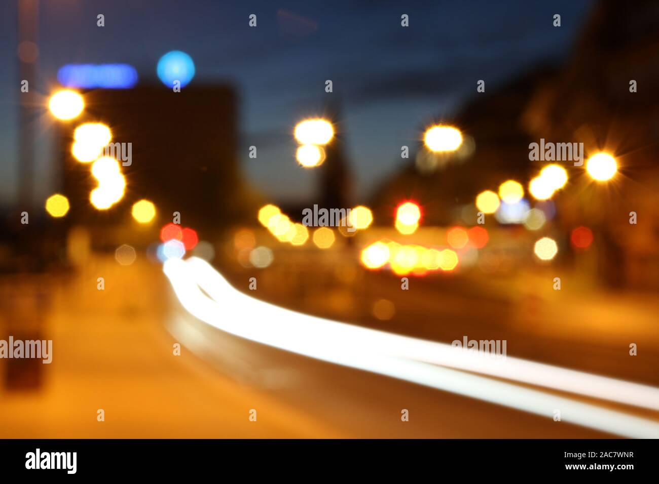 Out Of Focus Urban Night Scene With Blurry Traffic Light And Light Trail Of A Car In Motion Stock Photo Alamy Out Of Focus Urban Night Scene With Blurry Traffic Light And Light Trail Of A Car In Motion Stock Photo Alamy