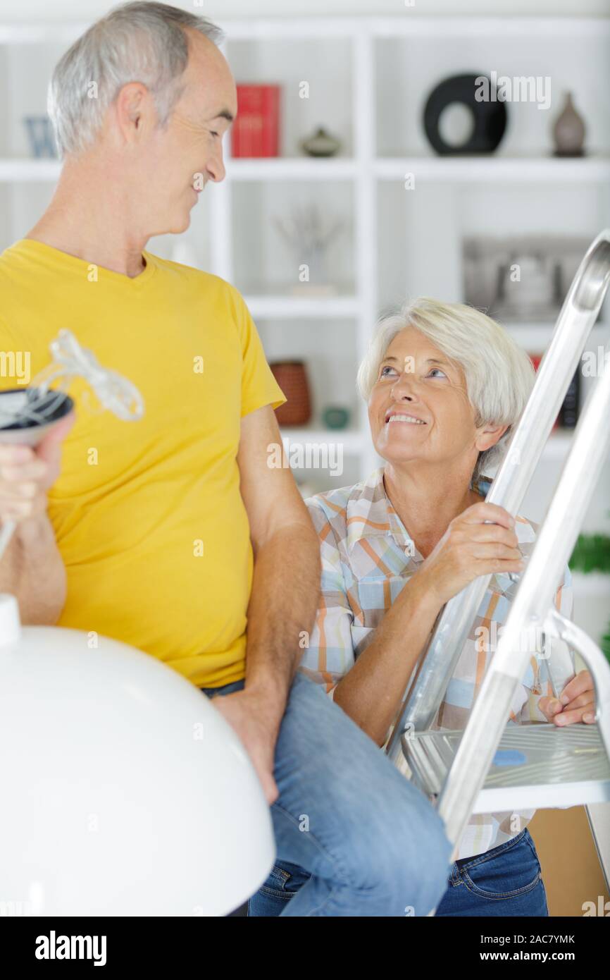 a senior couple doing diy Stock Photo