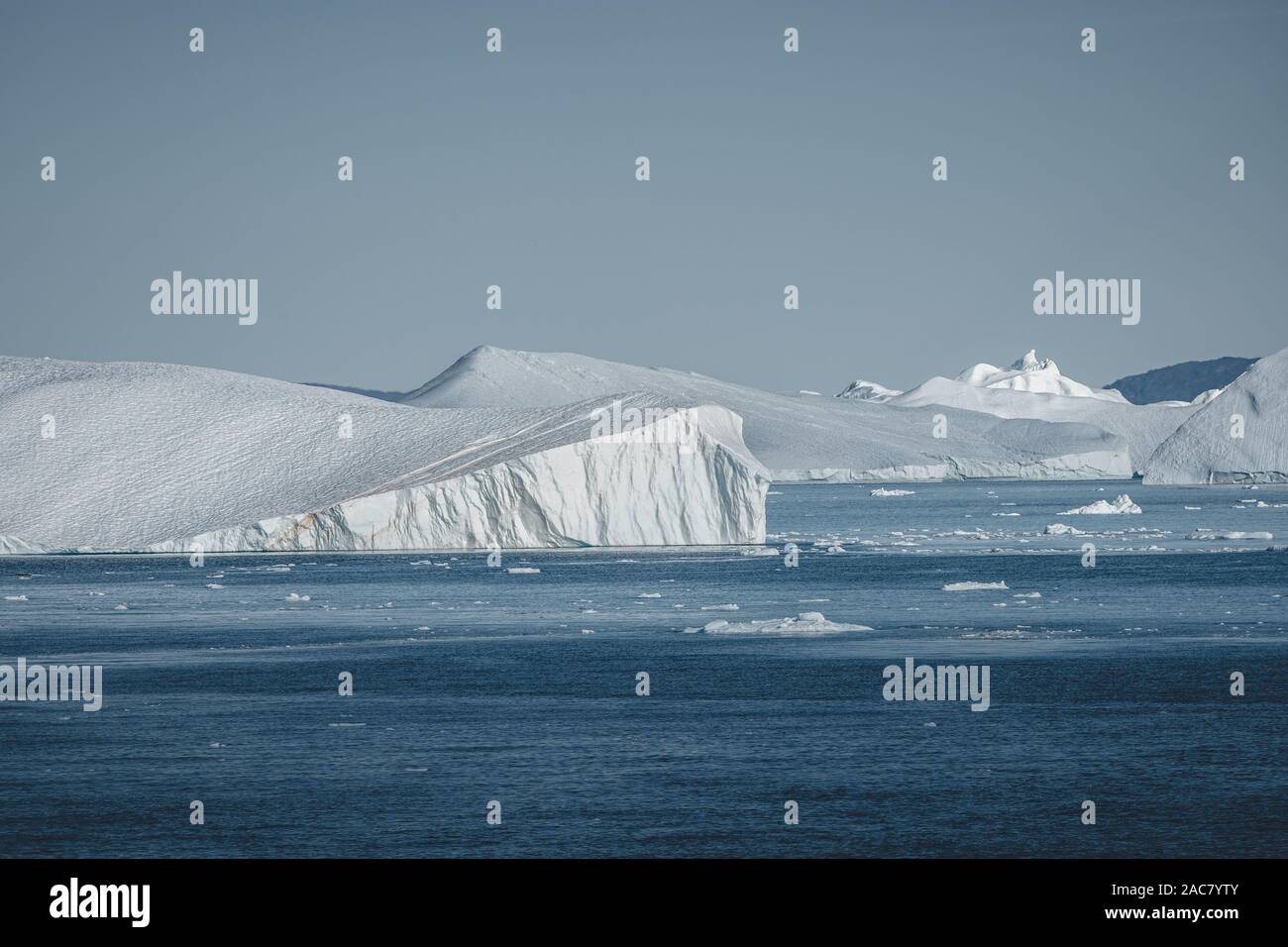 Greenland. The biggest glacier on a Jakobshavn. Huge icebergs of
