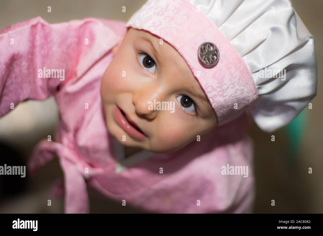 Portrait of a child in a pink Japanese-style dress Stock Photo