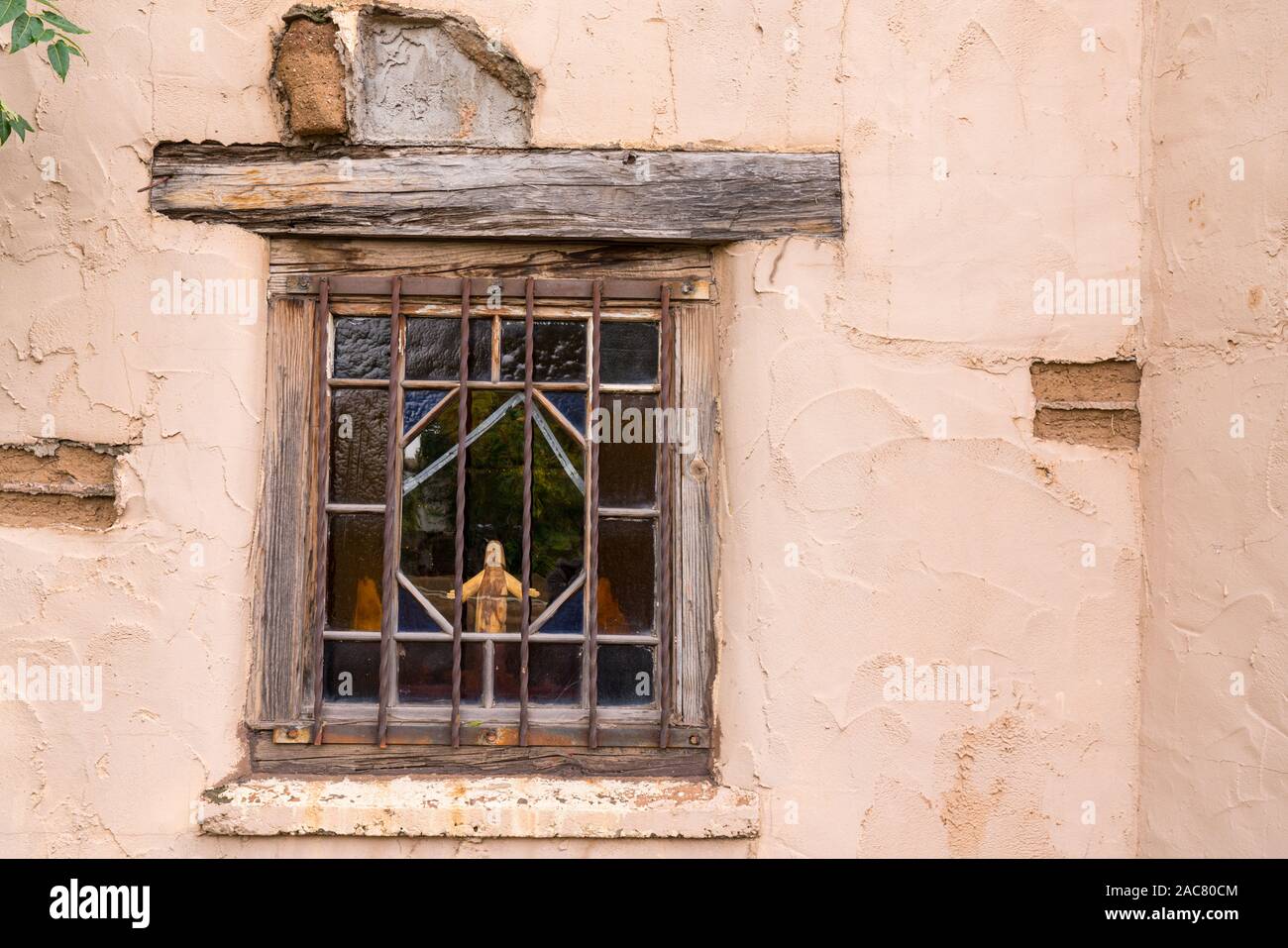 Old Southwestern Brown Adobe Wall and Window Stock Photo