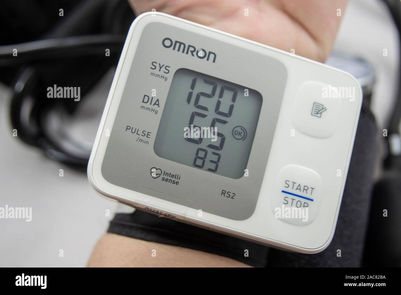 PARIS, FRANCE - OCT 30, 2018: Man holding new Omron Evolv Bluetooth  Wireless Upper Arm Blood Pressure Monitor against white background Stock  Photo - Alamy