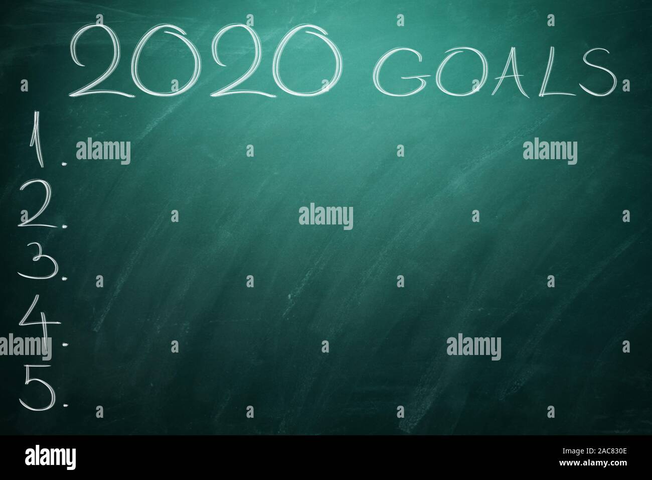 2020 Goals on green board. Chalkboard. Stock Photo