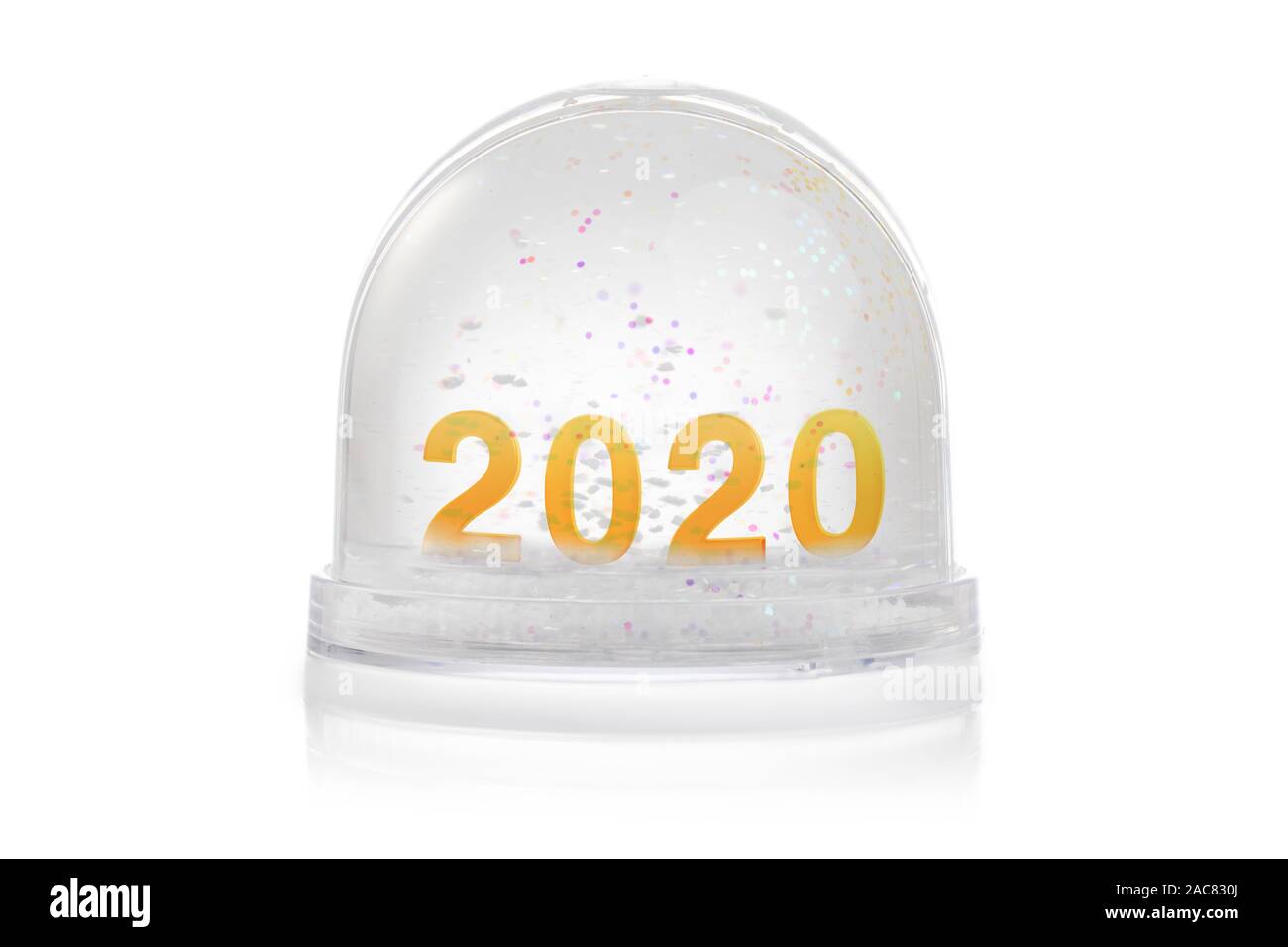 Paperweight with glitter isolated on white. Happy new year 2020 concept Stock Photo