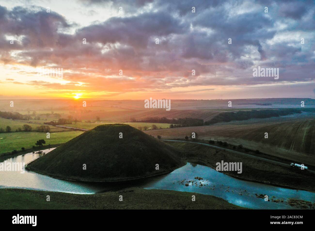 Silbury Hill, Nr Avebury, Wiltshire, UK. 30th November 2019. Drone images of the ancient man-made mound of Silbury Hill in Wiltshire almost completely Stock Photo