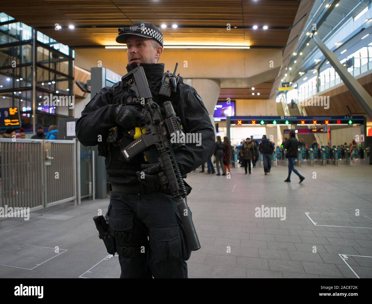 Armed police patrol London Bridge train station with an AR15 semi