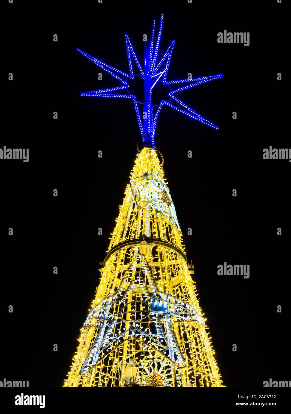 illuminated Christmas tree on black background Stock Photo