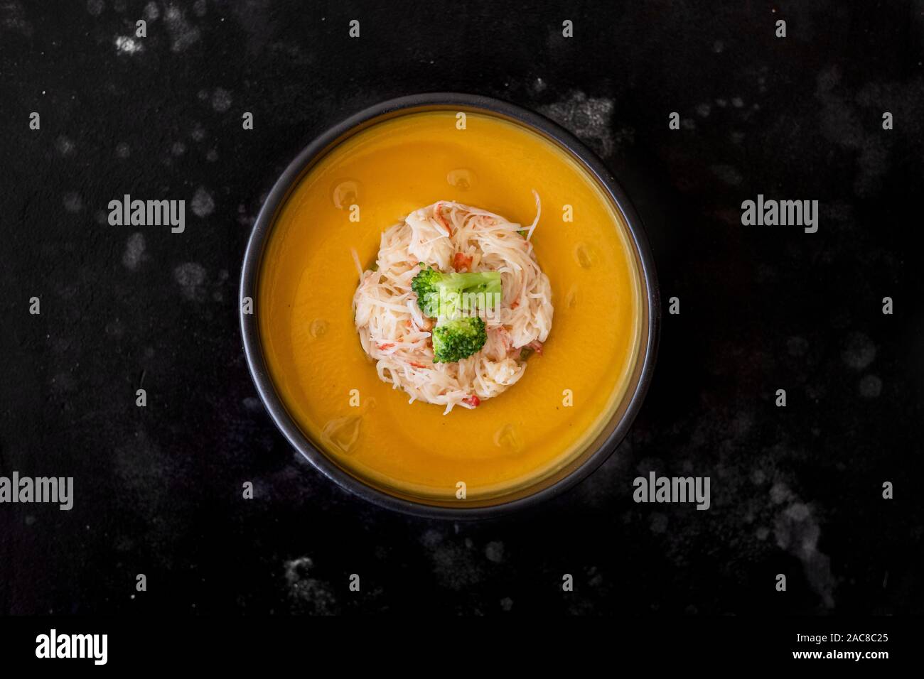 Cream soup with crab Stock Photo